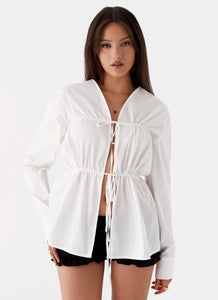 Womens Bridget Ruched Tie Front Shirt in the colour White in front of a light grey background