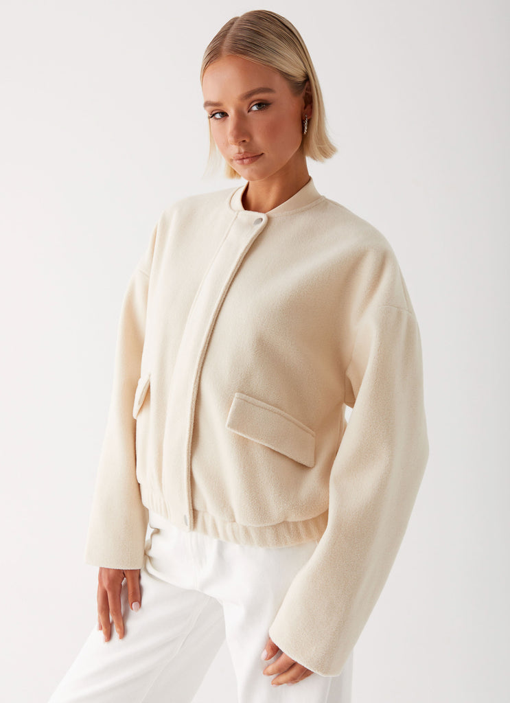 Womens Cloudia Bomber Jacket in the colour Ivory in front of a light grey background