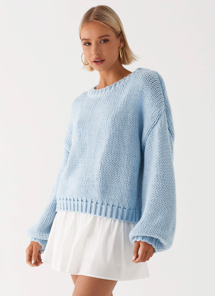 Womens Costella Knit Sweater in the colour Blue in front of a light grey background