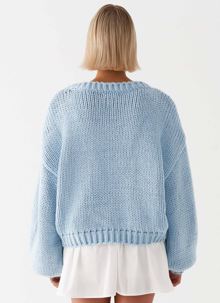 Womens Costella Knit Sweater in the colour Blue in front of a light grey background