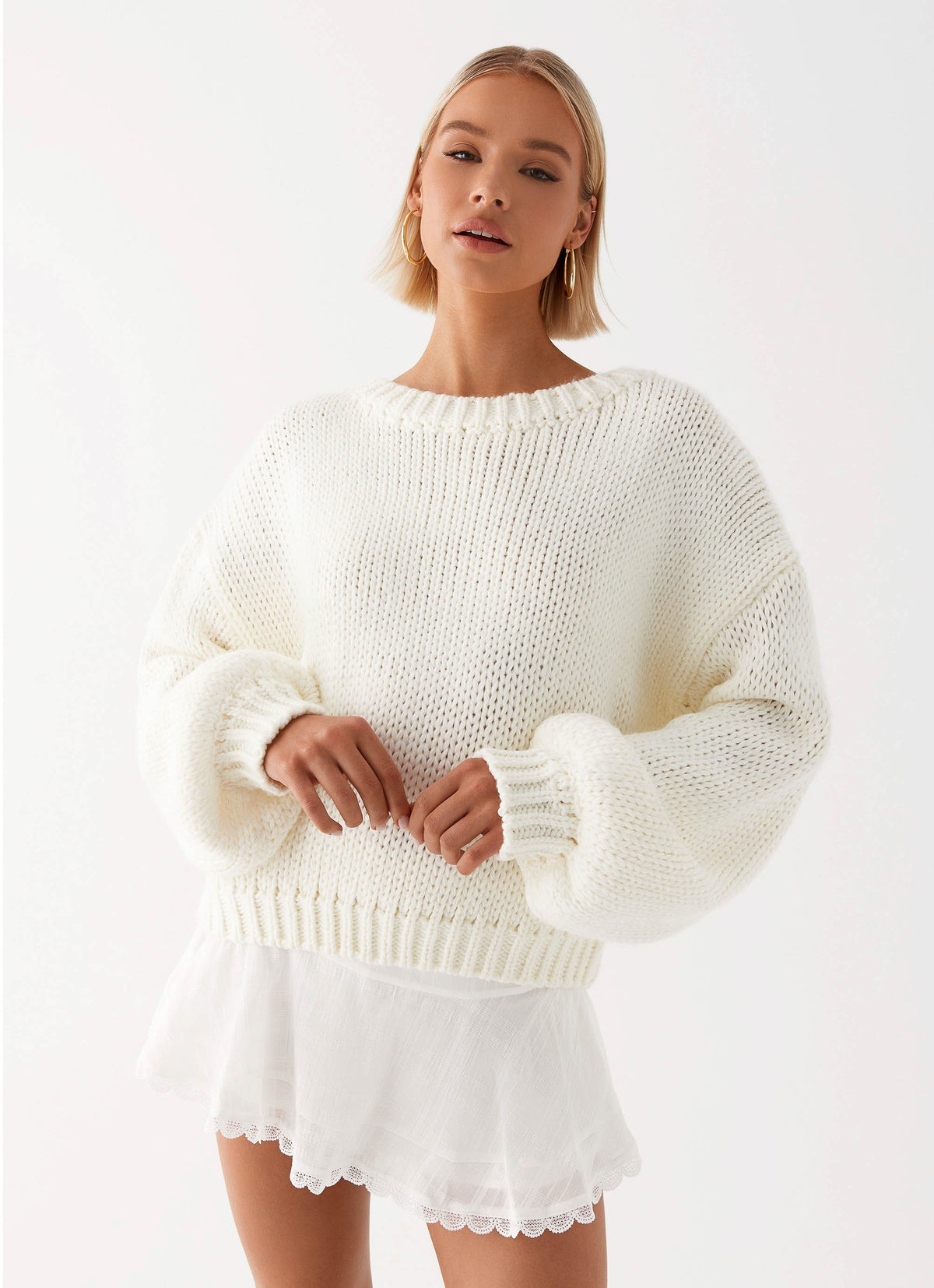 Womens Nelly Off Shoulder Mini Dress  in the colour  Pistachio in front of the colour light grey