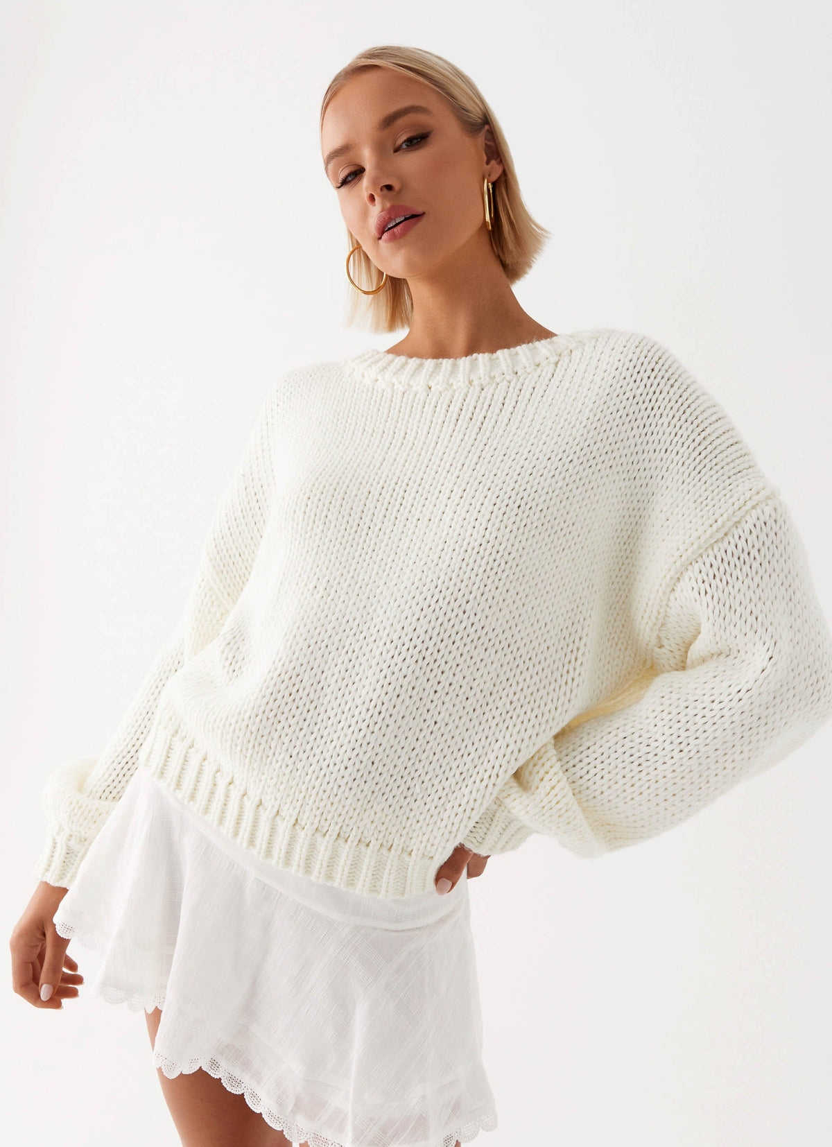 Womens Nelly Off Shoulder Mini Dress  in the colour  Pistachio in front of the colour light grey