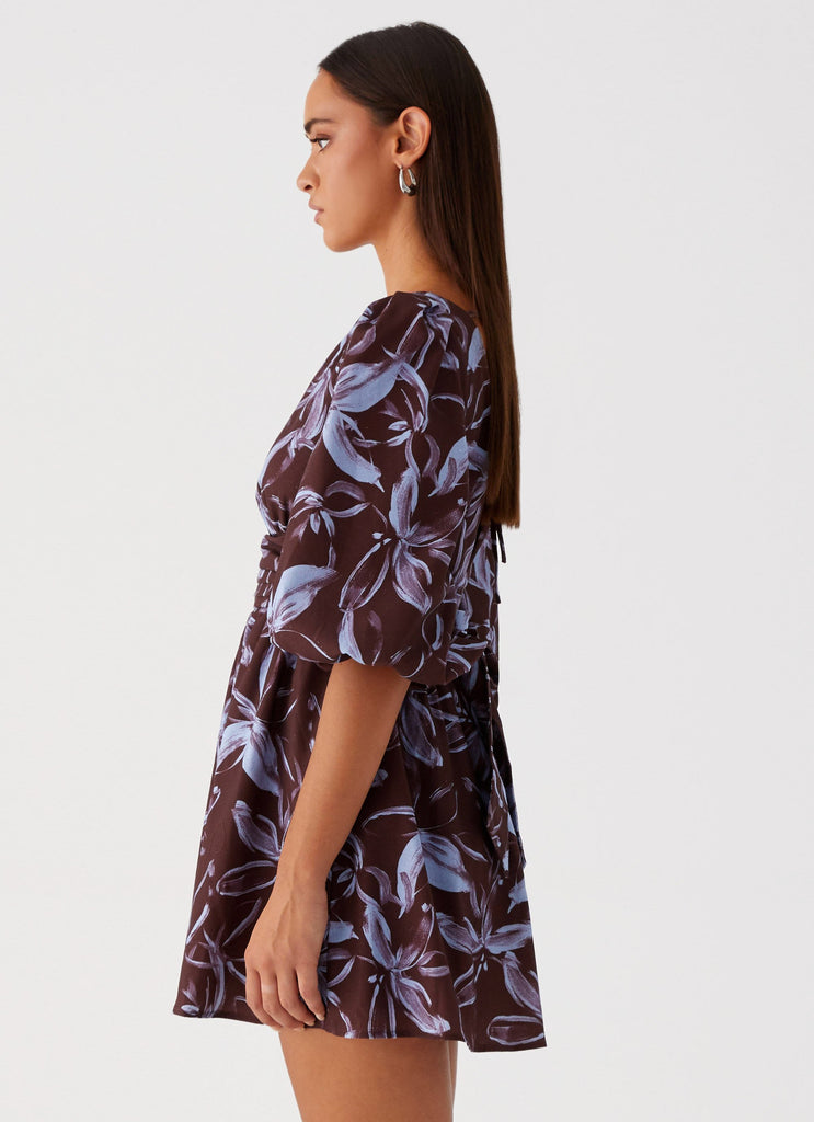 Womens Crystal Dreams Mini Dress in the colour Brown Purple Floral in front of a light grey background