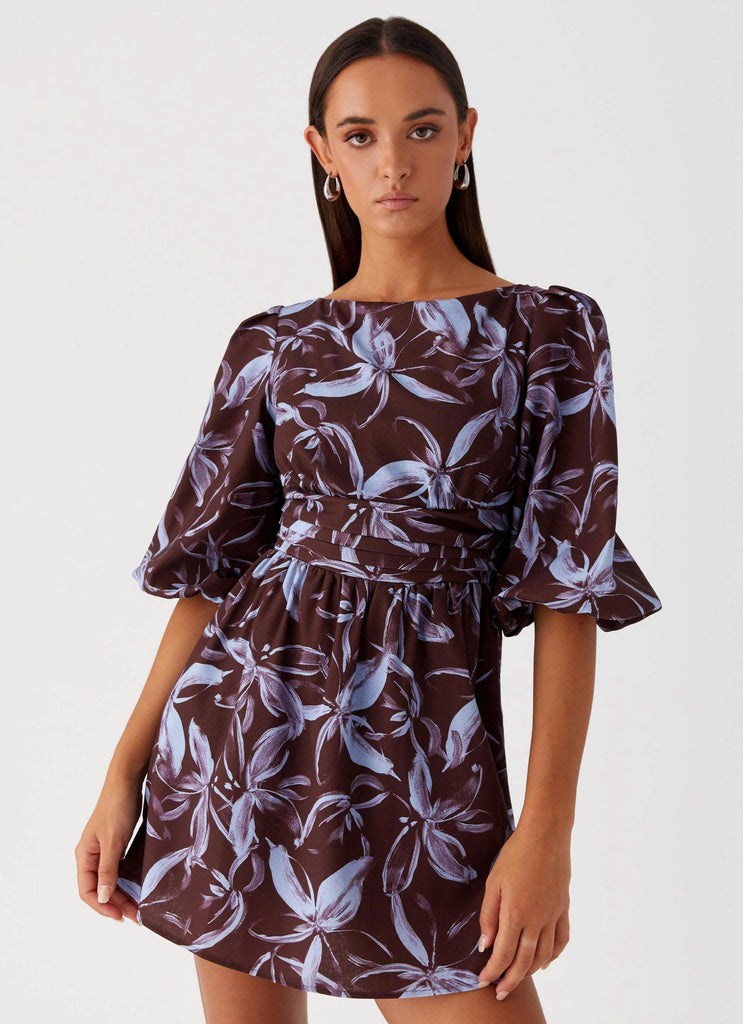 Womens Crystal Dreams Mini Dress in the colour Brown Purple Floral in front of a light grey background