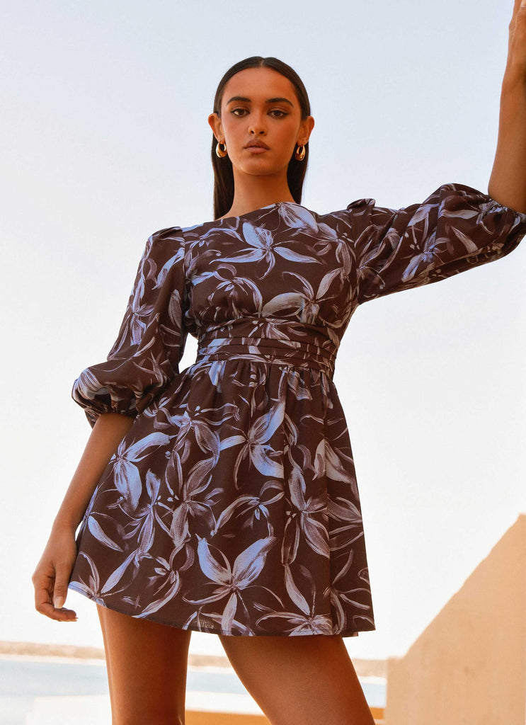 Womens Crystal Dreams Mini Dress in the colour Brown Purple Floral in front of a light grey background