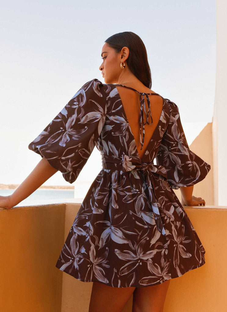 Womens Crystal Dreams Mini Dress in the colour Brown Purple Floral in front of a light grey background