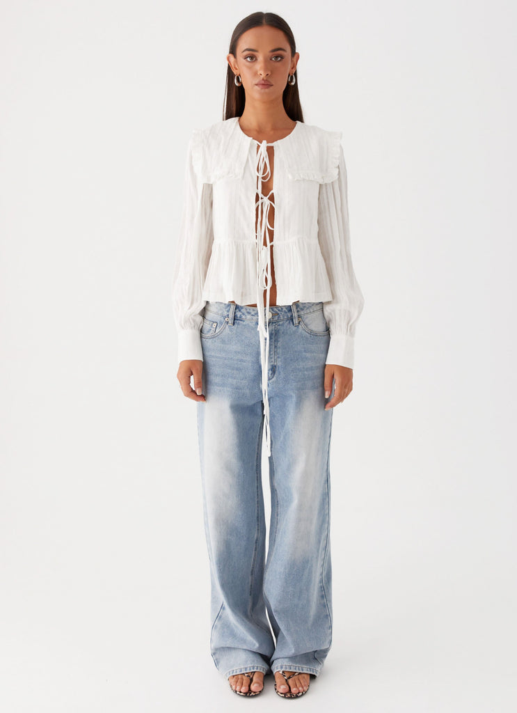Womens Emerson Tie Front Long Sleeve Top in the colour White in front of a light grey background