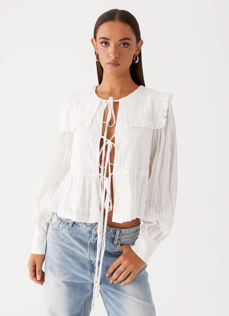 Womens Emerson Tie Front Long Sleeve Top in the colour White in front of a light grey background