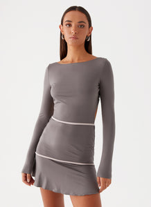 Womens French Flirt Mini Dress in the colour Charcoal in front of a light grey background