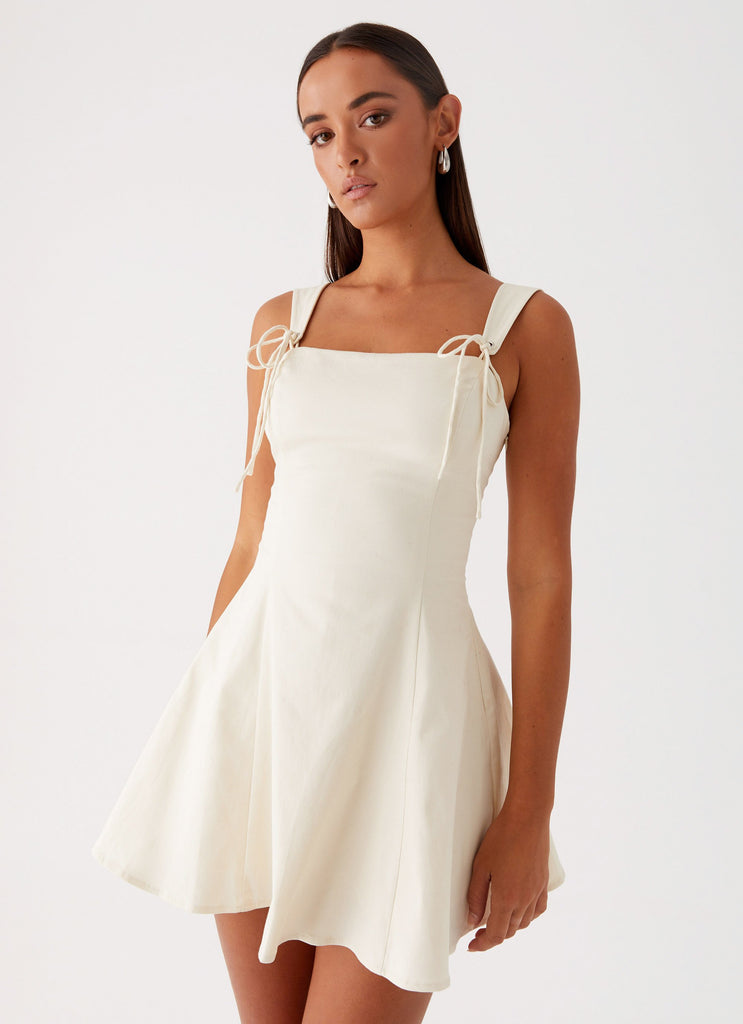 Womens Jamaya Tie Mini Dress in the colour Ivory in front of a light grey background