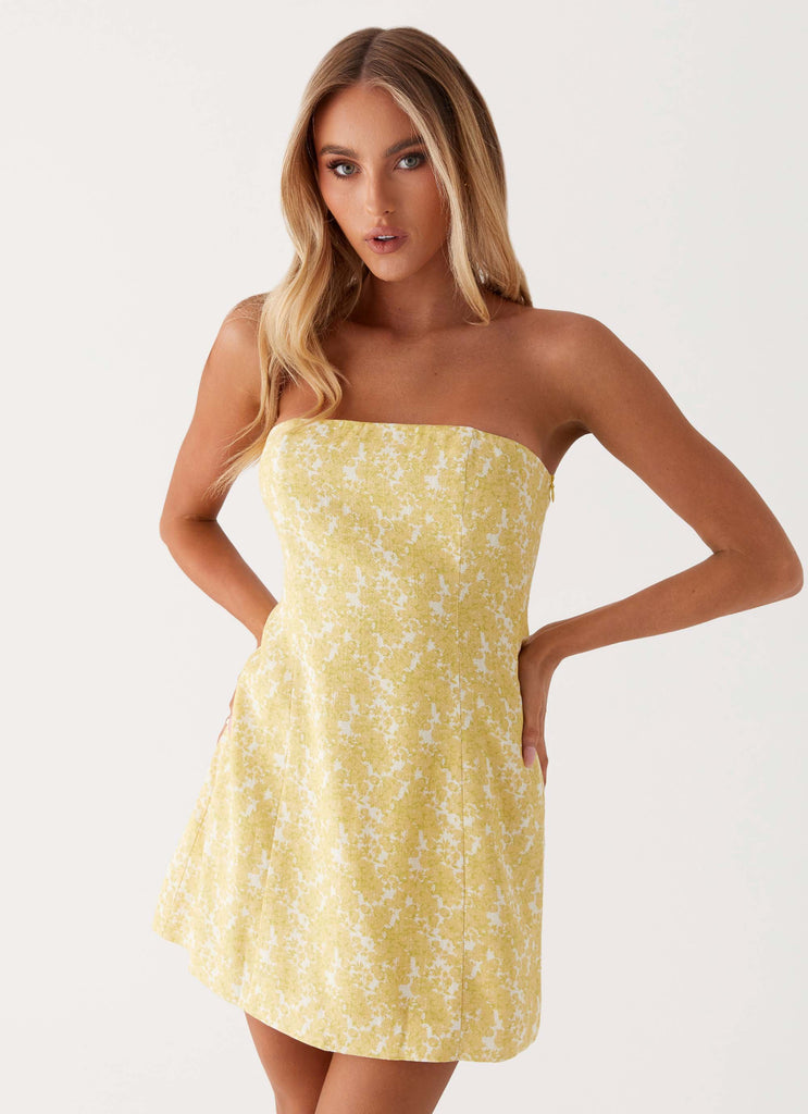 Womens Livvy Strapless Mini Dress in the colour Yellow Floral in front of a light grey background