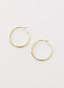 Womens Mutual Feelings Earrings in the colour Gold in front of a light grey background