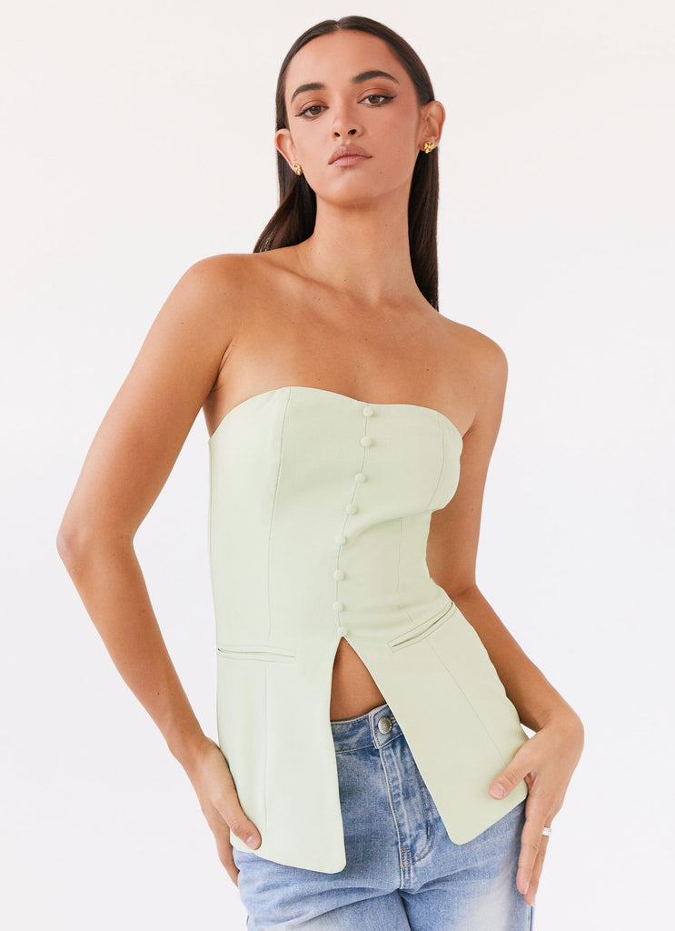 Womens Riveria Tailored Strapless Top in the colour Green Zest in front of a light grey background