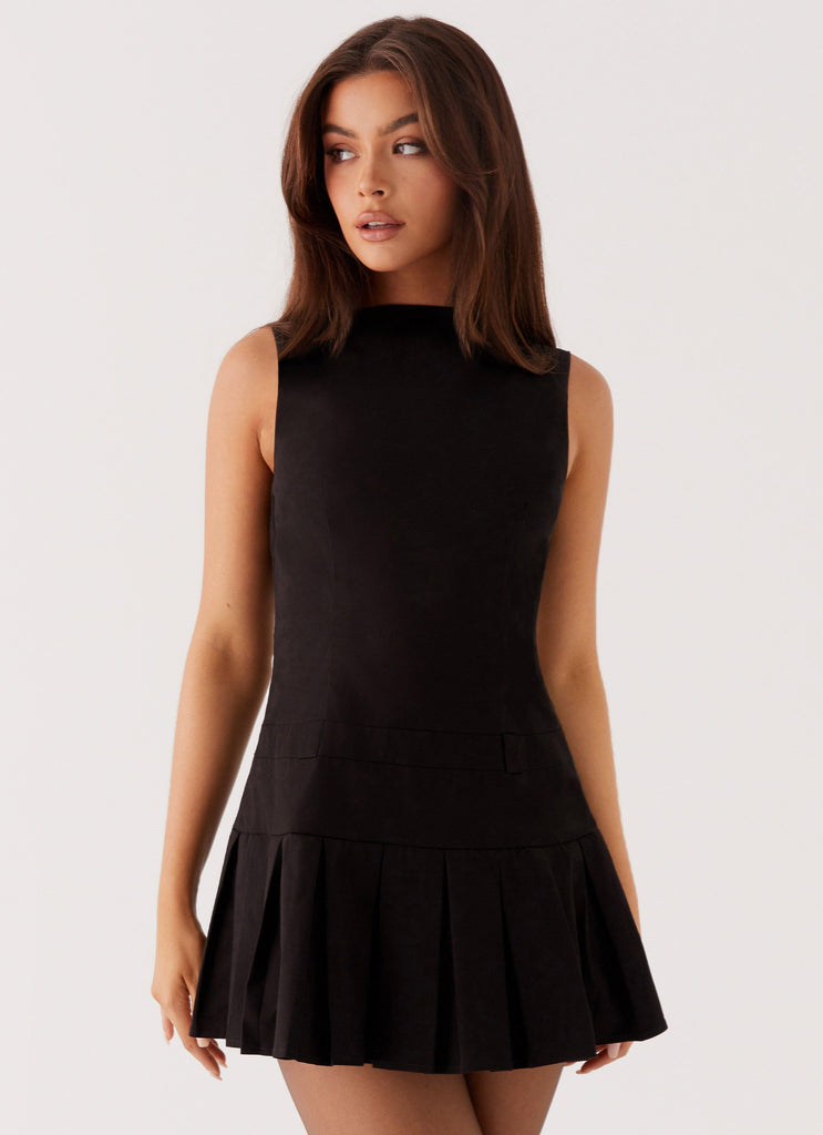 Womens Twilight Pleated Mini Dress in the colour Black in front of a light grey background