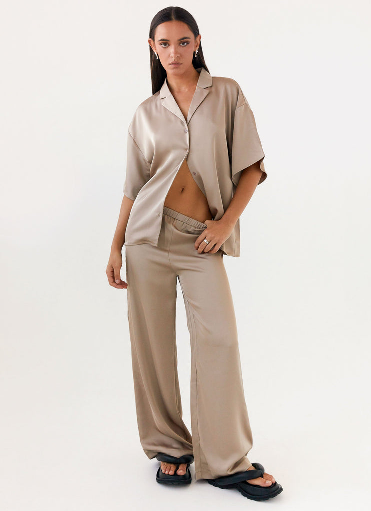 Womens Palm Cove Satin Pants in the colour Mushroom in front of a light grey background