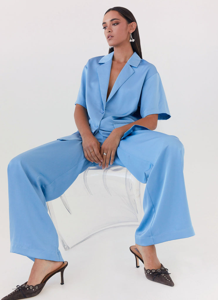 Womens Brinkley Oversized Satin Shirt in the colour Sky Blue in front of a light grey background