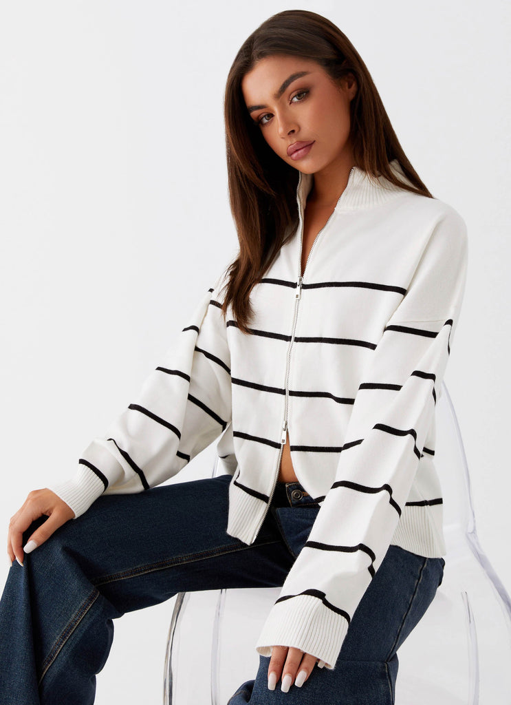 Womens Kimmy Oversized Knit Cardigan in the colour Ivory Stripe in front of a light grey background