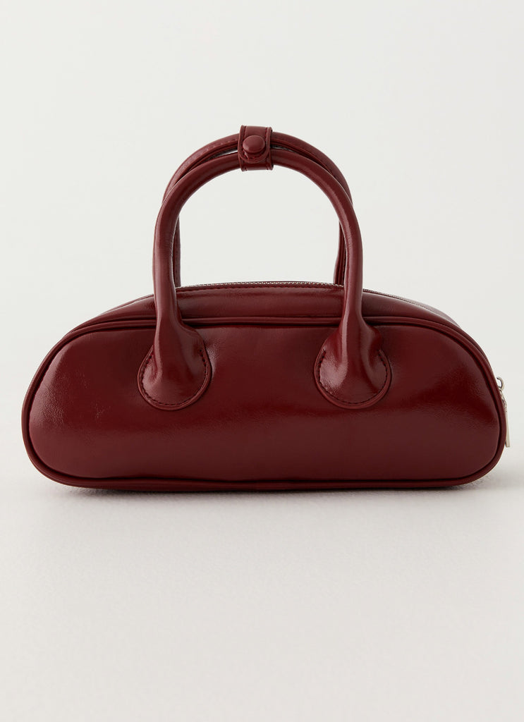 Womens Breanna Mini Bag in the colour Red in front of a light grey background