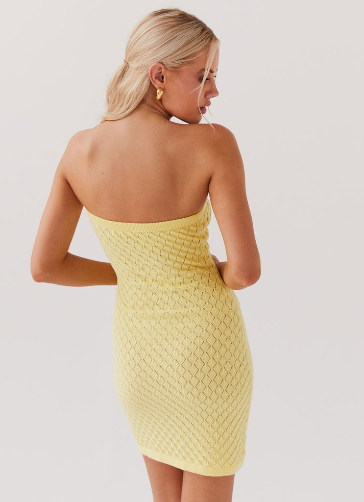 Womens Lifeline Knit Tube Mini Dress in the colour Lemon in front of a light grey background