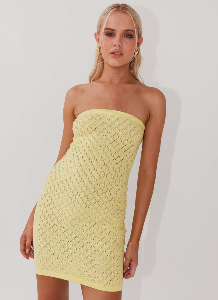 Womens Lifeline Knit Tube Mini Dress in the colour Lemon in front of a light grey background