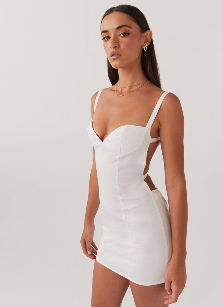 Womens Naomi Backless Mini Dress in the colour White in front of a light grey background