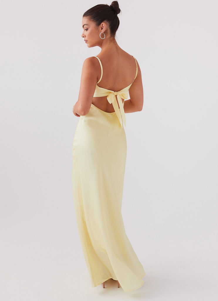 Womens Flora Satin Maxi Dress in the colour Lemon in front of a light grey background