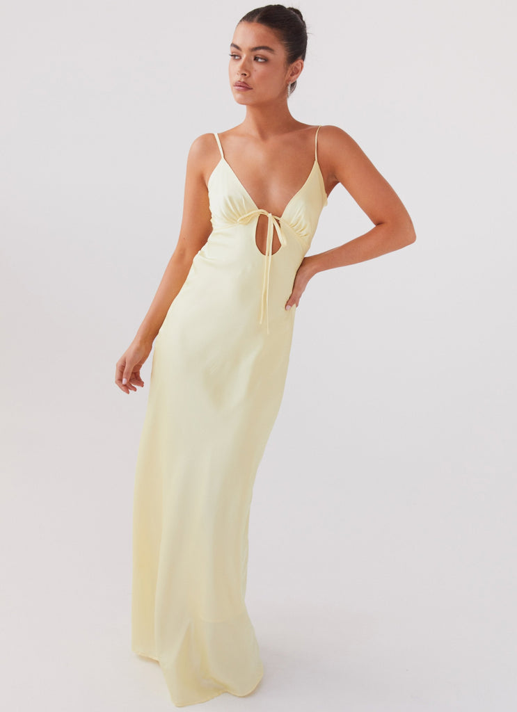 Womens Flora Satin Maxi Dress in the colour Lemon in front of a light grey background