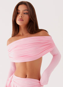 Womens Bardot Long Sleeve Crop Top in the colour Candy Pink in front of a light grey background