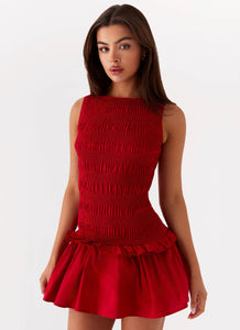 Womens Garden Kiss Mini Dress in the colour Red in front of a light grey background