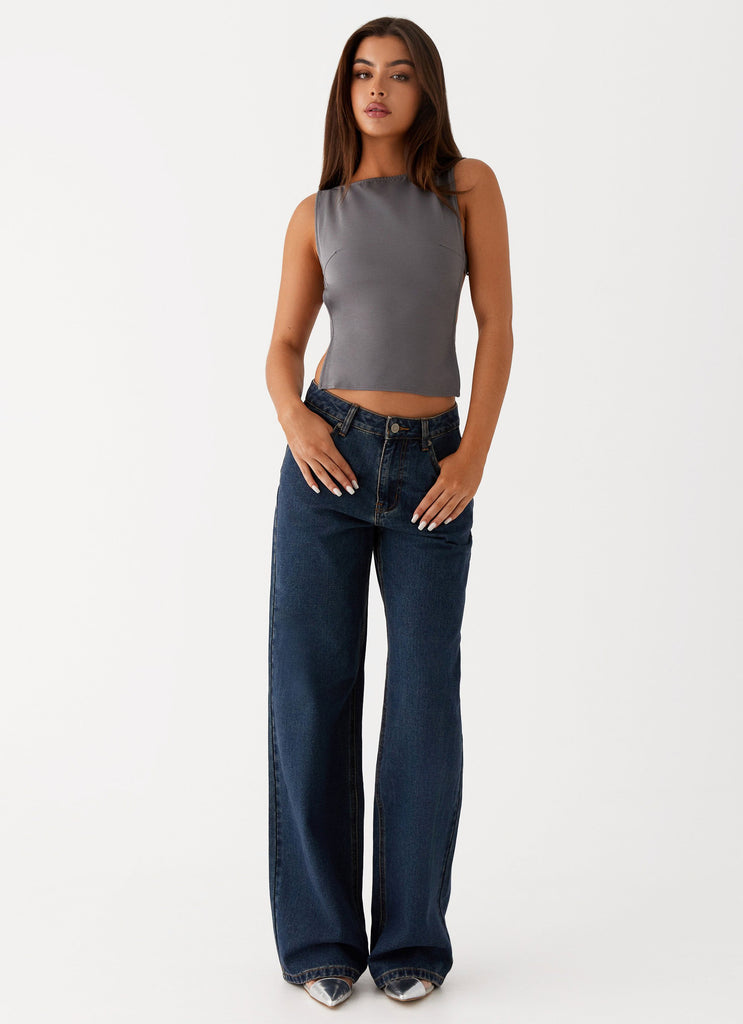 Womens Keanna Low Rise Denim Jeans in the colour Washed Denim in front of a light grey background