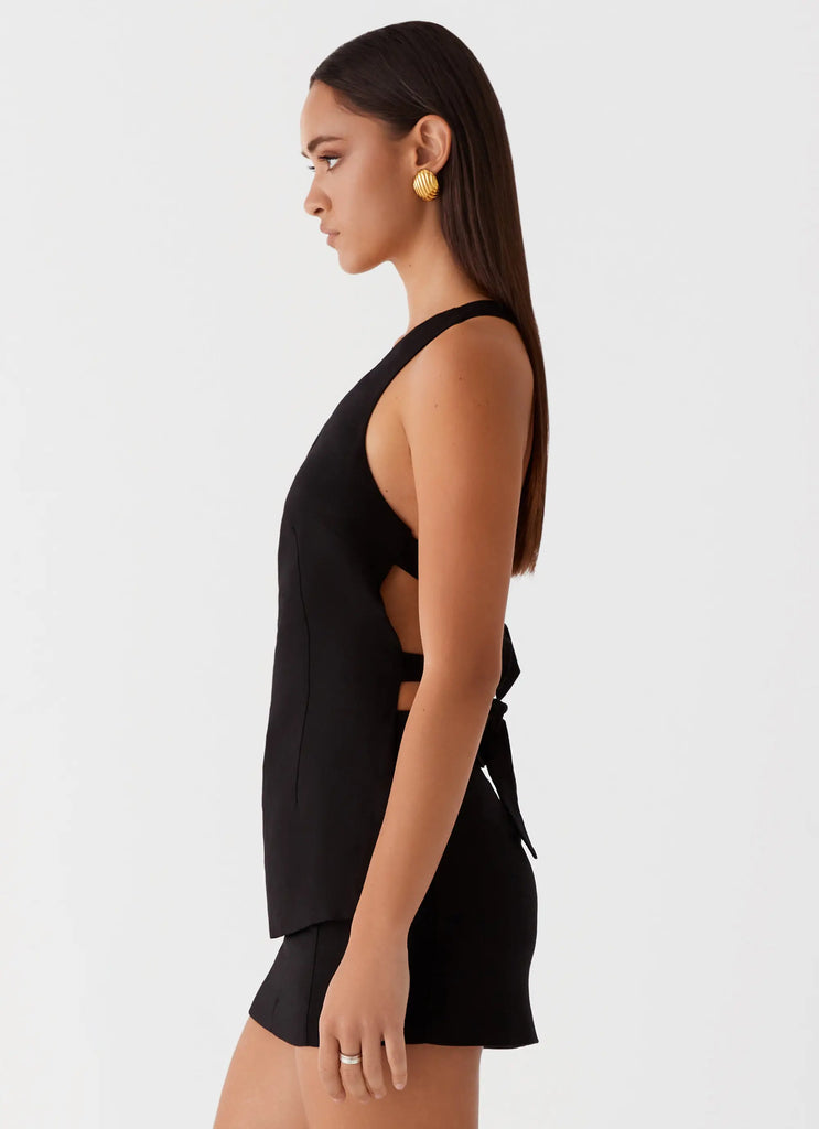 Womens Olsen Linen One Shoulder Top in the colour Black in front of a light grey background