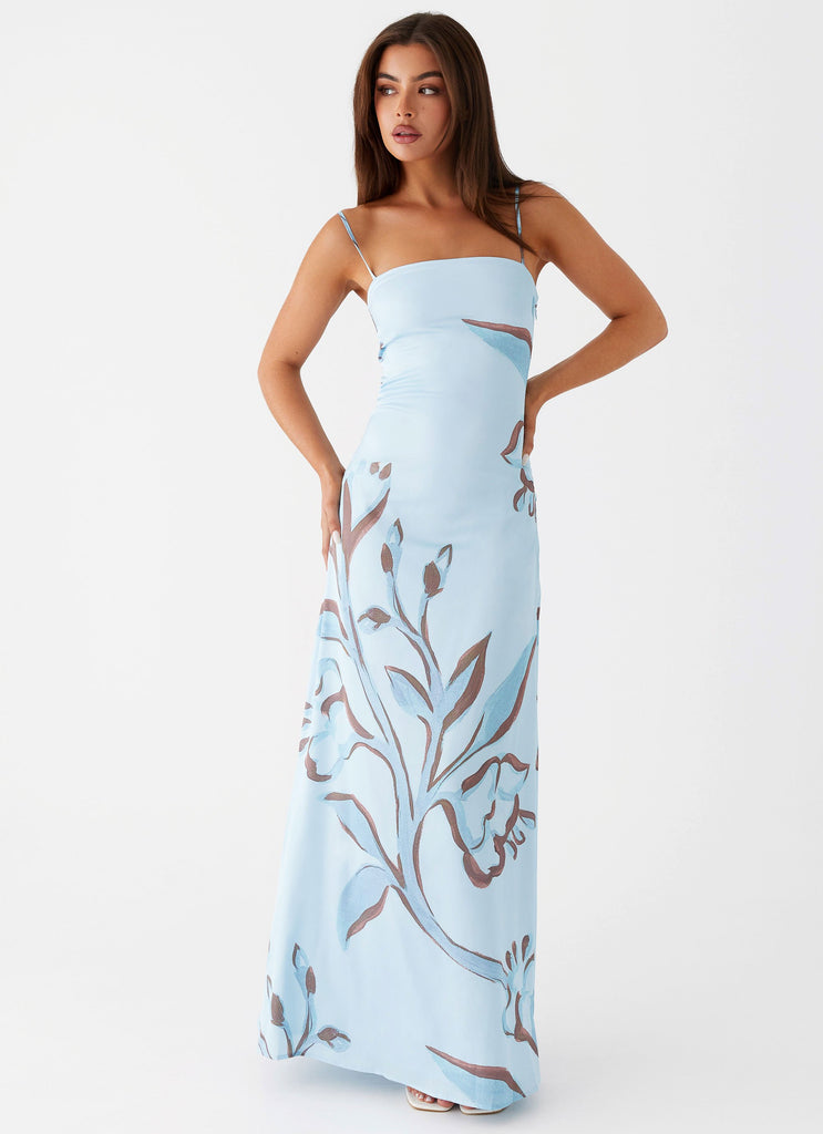 Womens Aster Bloom Maxi Dress in the colour Blue Floral in front of a light grey background