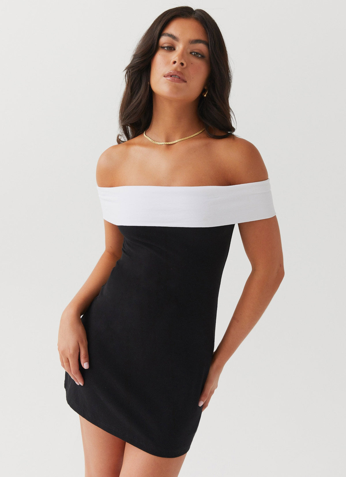 Womens Diamonds and Pearls Mini Dress in the colour Black in front of a light grey background