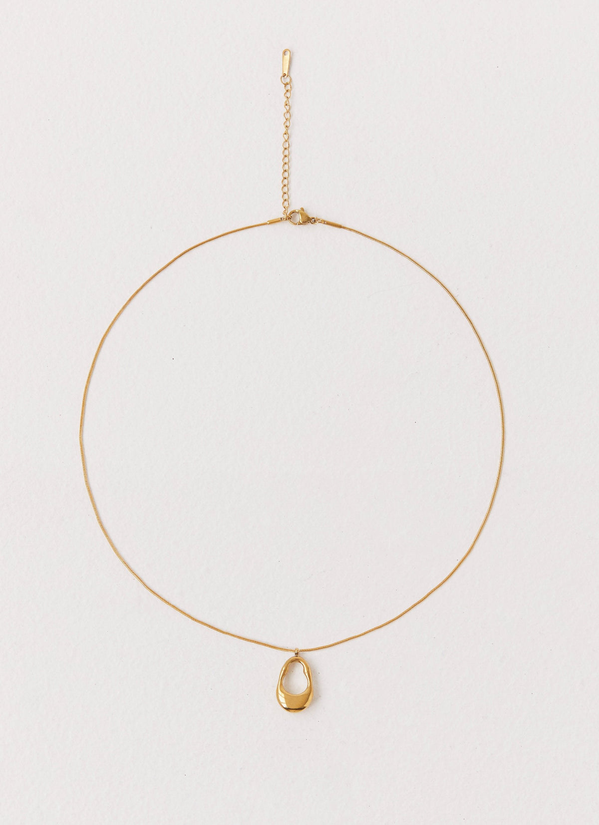 Womens Blissful Necklace in the colour Gold in front of a light grey background