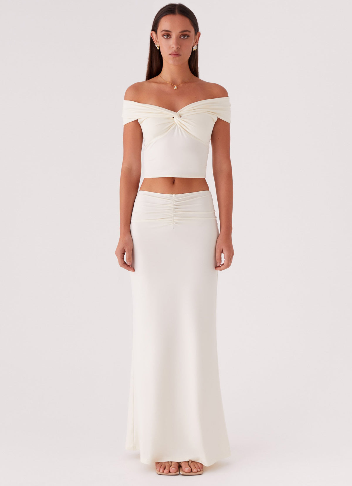 Womens Trixie Twist Off Shoulder Top in the colour Ivory in front of a light grey background