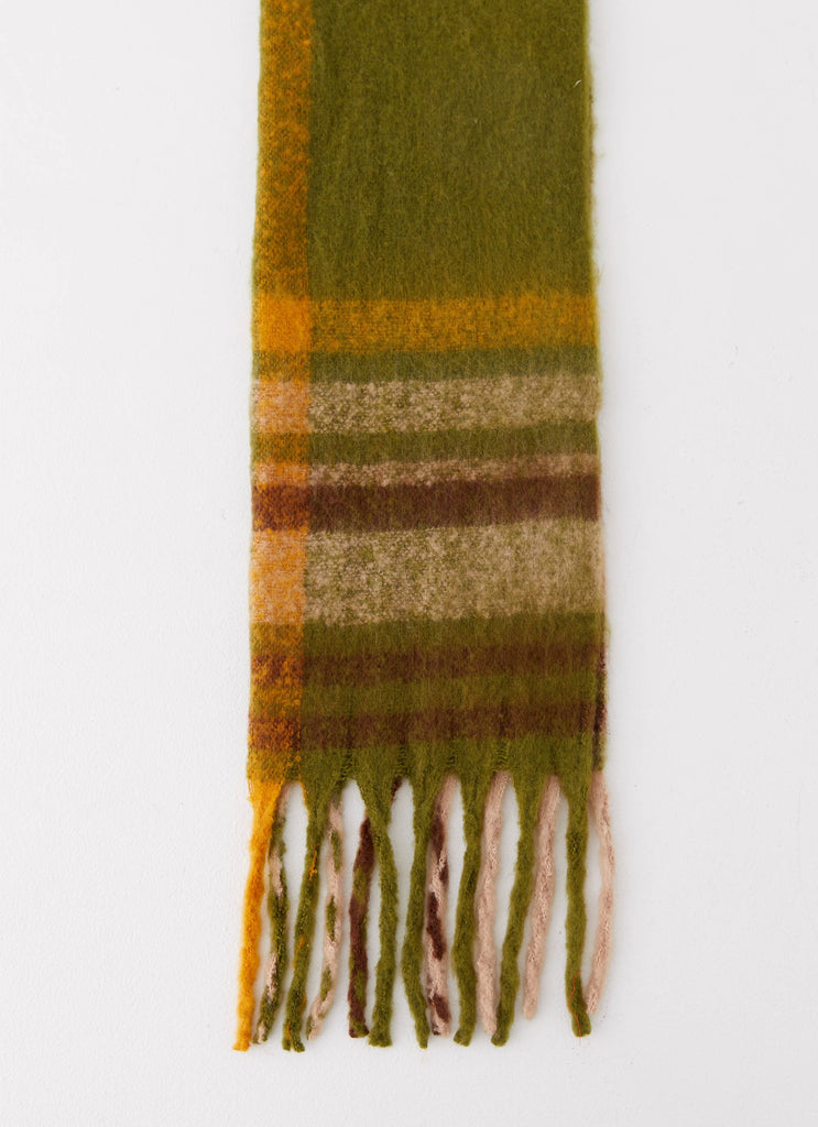 Womens Rainier Plaid Scarf in the colour Green in front of a light grey background