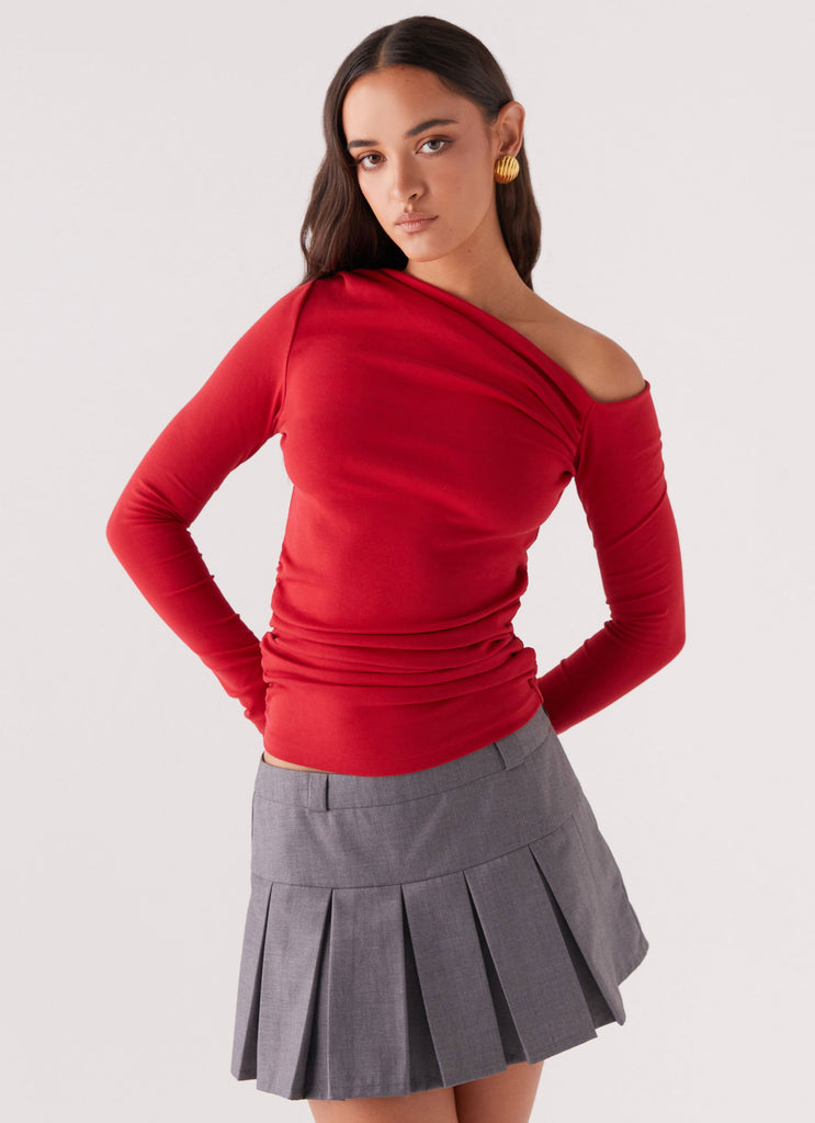 Womens Kiki Long Sleeve Top in the colour Cherry in front of a light grey background