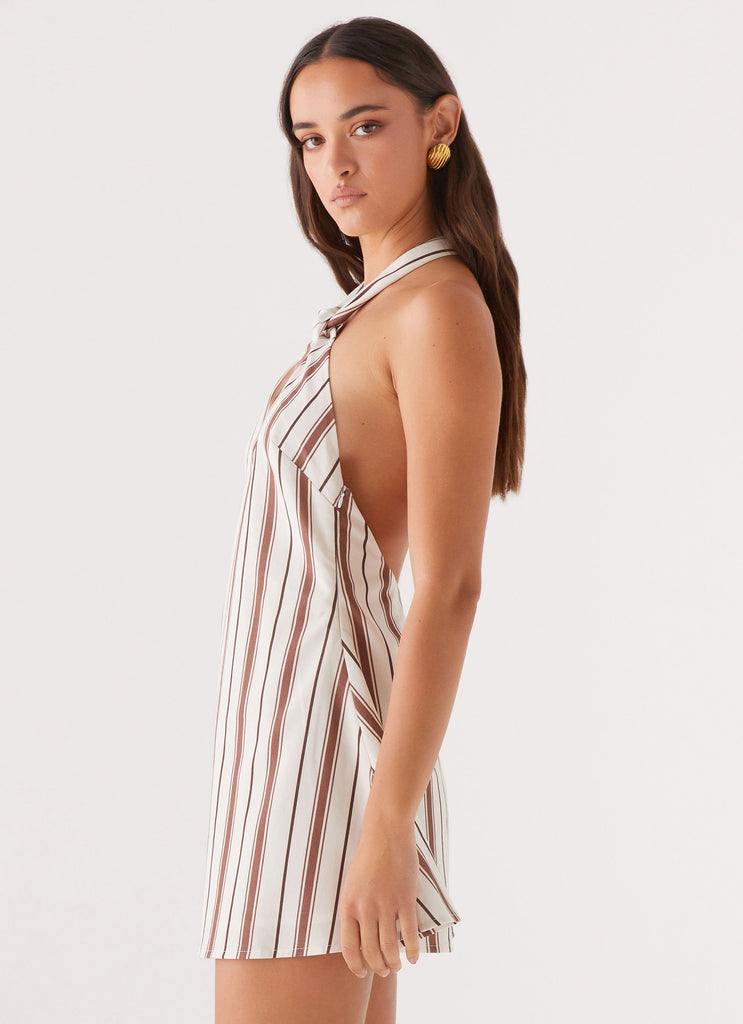 Womens Keira Linen Mini Dress in the colour Passionfruit Stripe in front of a light grey background