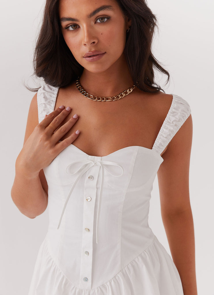 Womens Rebel Heart Corset Dress in the colour White in front of a light grey background