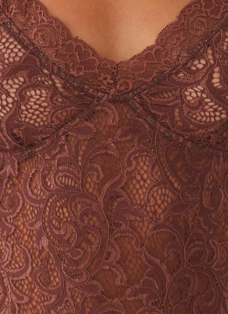 Womens Nobody's Business Lace Dress in the colour Chocolate in front of a light grey background