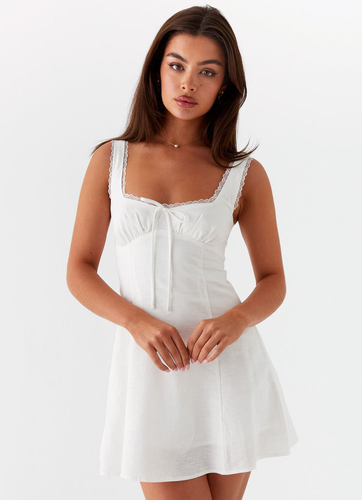 Womens Rowena Mini Dress in the colour White in front of a light grey background