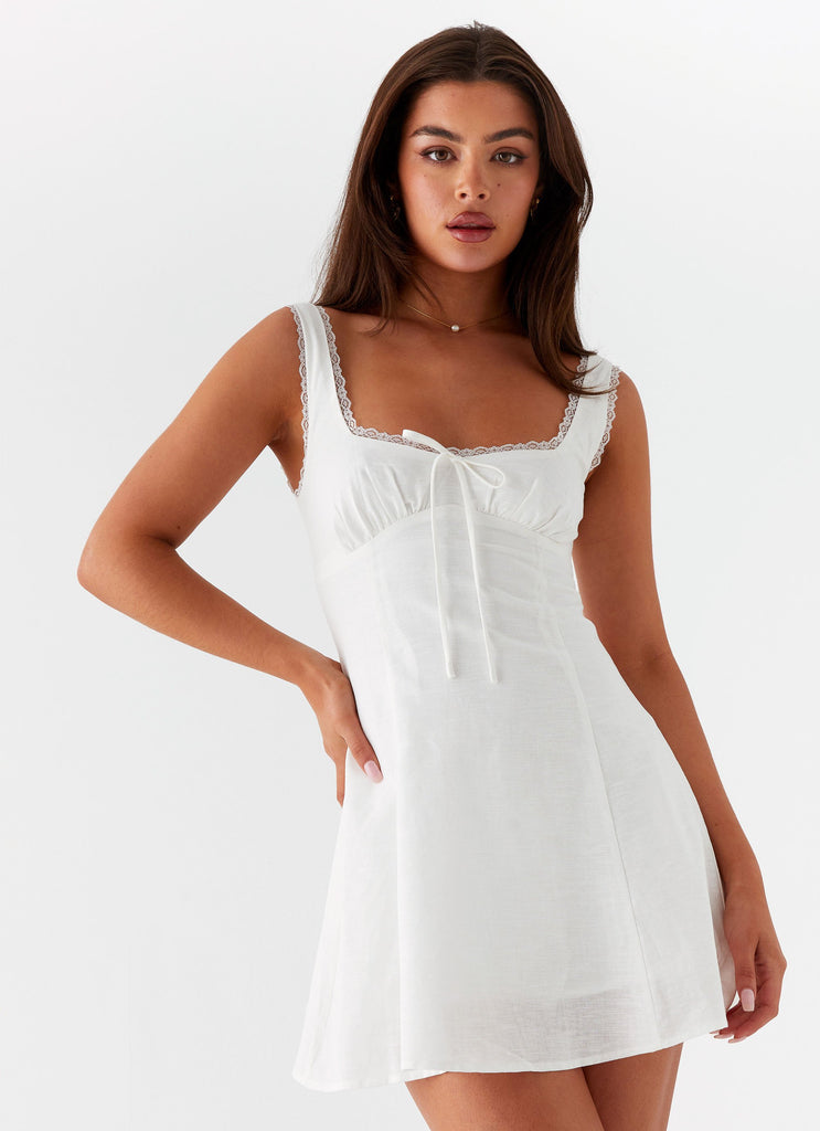 Womens Rowena Mini Dress in the colour White in front of a light grey background