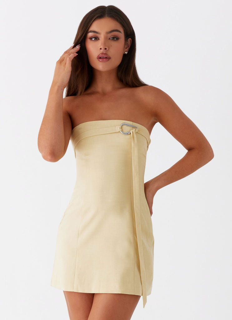 Womens Saskia Mini Dress in the colour Yellow in front of a light grey background