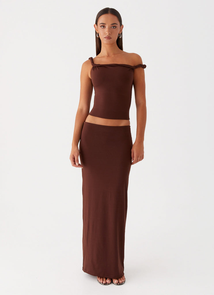 Womens Solace Soul Twist Shoulder Top in the colour Chocolate in front of a light grey background