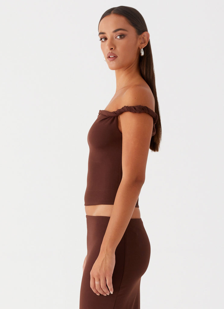 Womens Solace Soul Twist Shoulder Top in the colour Chocolate in front of a light grey background